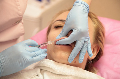 Lip filler injections are a popular cosmetic treatment to plump lips