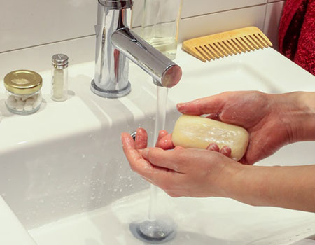 Person holding soap