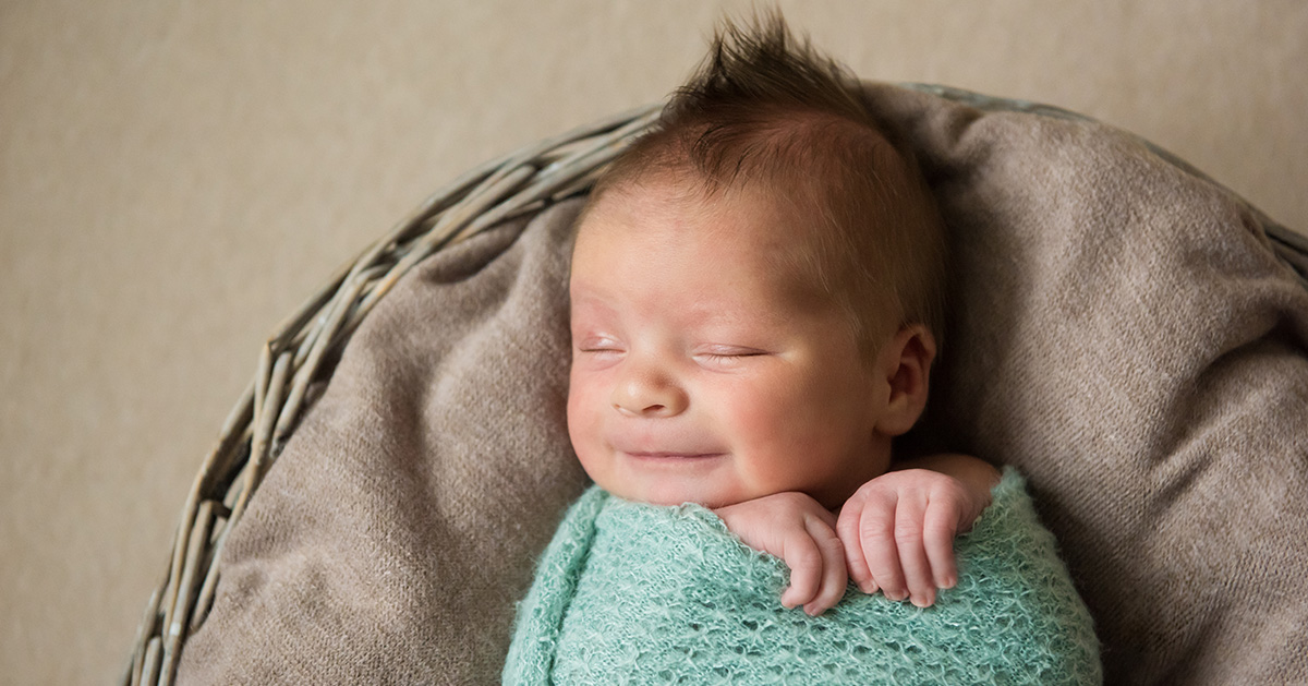 Baby with soft fuzz of hair