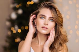 closeup of a beautiful woman posing while showcasing her new year skin cosmetic treatment